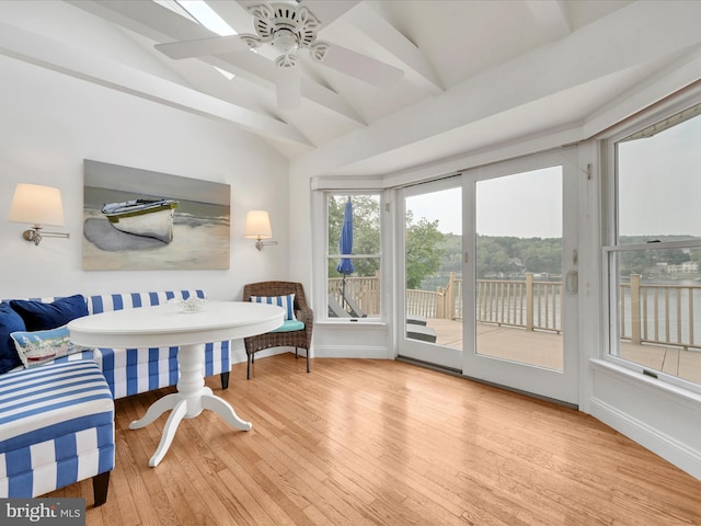 2054 Buckskin Cv, Auburn, PA 17922 - dining area with vaulted ceiling, wood finished floors, ceiling fan, and baseboards