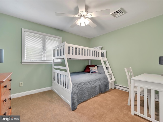 2054 Buckskin Cv, Auburn, PA 17922 - carpeted bedroom with a baseboard heating unit, baseboards, and a ceiling fan