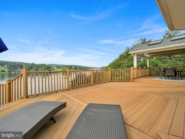 2054 Buckskin Cv, Auburn, PA 17922 - wooden deck with a water view and outdoor dining space