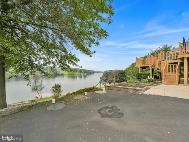 2054 Buckskin Cv, Auburn, PA 17922 - view of yard featuring stairway and a deck with water view