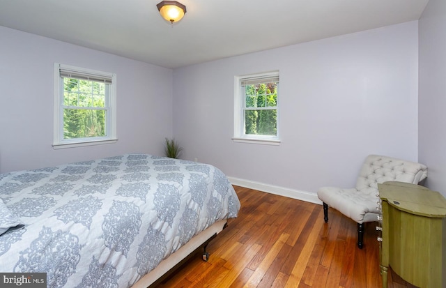 921 Coopertown Rd, Bryn Mawr, PA 19010 - bedroom featuring wood-type flooring and baseboards