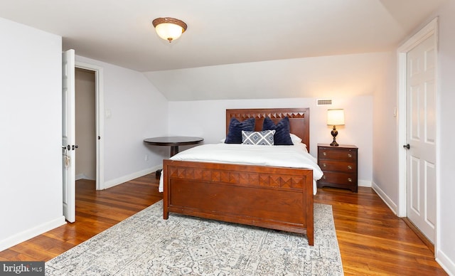 921 Coopertown Rd, Bryn Mawr, PA 19010 - bedroom with wood finished floors, baseboards, and lofted ceiling