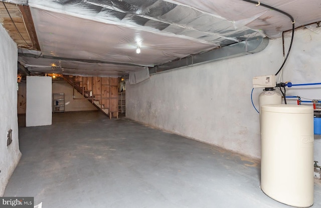 921 Coopertown Rd, Bryn Mawr, PA 19010 - unfinished below grade area featuring a water softener and stairs