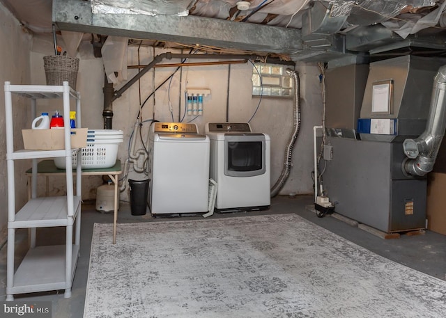 921 Coopertown Rd, Bryn Mawr, PA 19010 - basement featuring washer and clothes dryer and heating unit