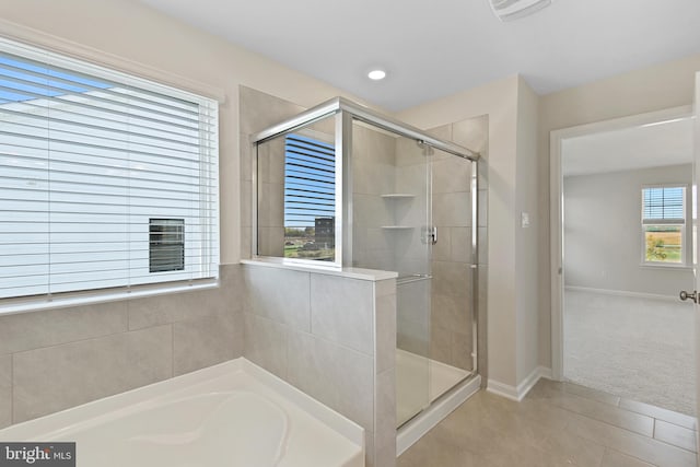 475 Ensemble Way, Frederick, MD 21701 - full bathroom with a shower stall, a bath, baseboards, and tile patterned flooring