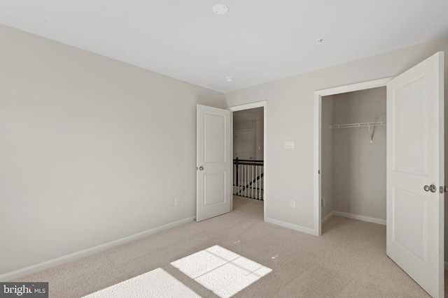 475 Ensemble Way, Frederick, MD 21701 - unfurnished bedroom with light colored carpet, baseboards, and a closet