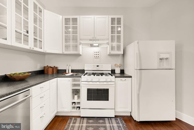 6914 6th St NW, Washington, DC 20012 - kitchen with white appliances, dark countertops, white cabinetry, and custom exhaust hood
