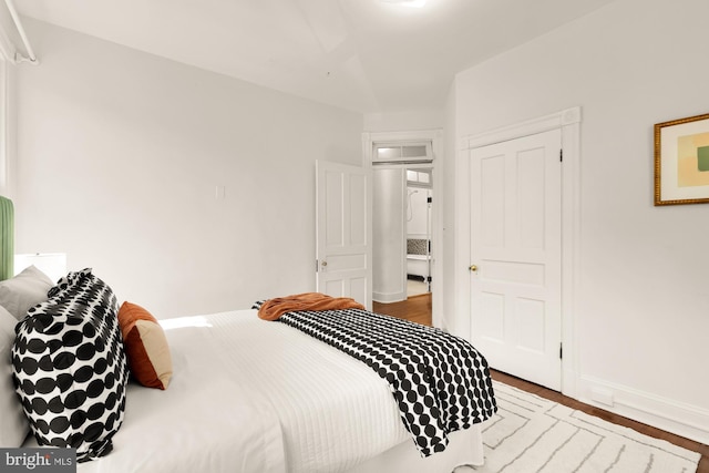 6914 6th St NW, Washington, DC 20012 - bedroom featuring wood finished floors and baseboards