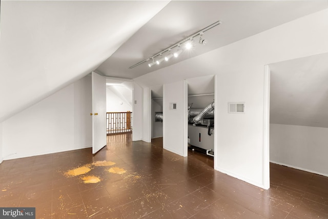 6914 6th St NW, Washington, DC 20012 - additional living space featuring lofted ceiling, tile patterned floors, and baseboards