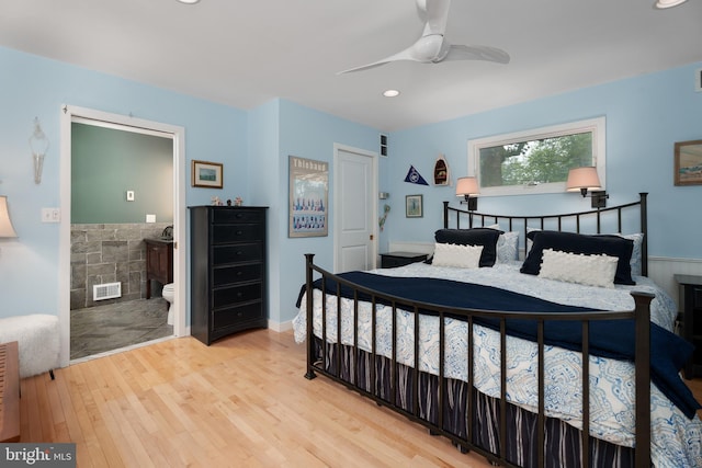 84 Cuyler Rd, Princeton, NJ 08540 - bedroom featuring light wood finished floors, recessed lighting, connected bathroom, ceiling fan, and a fireplace
