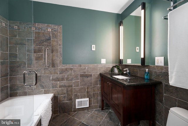 84 Cuyler Rd, Princeton, NJ 08540 - bathroom featuring tile walls, vanity,  shower combination, and a wainscoted wall