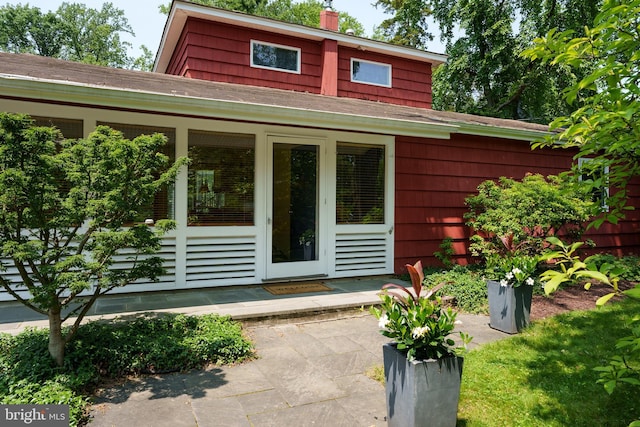 84 Cuyler Rd, Princeton, NJ 08540 - property entrance with a shingled roof and a chimney