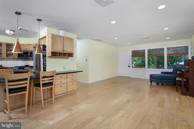 84 Cuyler Rd, Princeton, NJ 08540 - kitchen with appliances with stainless steel finishes, dark countertops, light wood finished floors, decorative backsplash, and recessed lighting