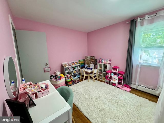 701 25th St, Huntingdon, PA 16652 - game room featuring baseboard heating and wood finished floors