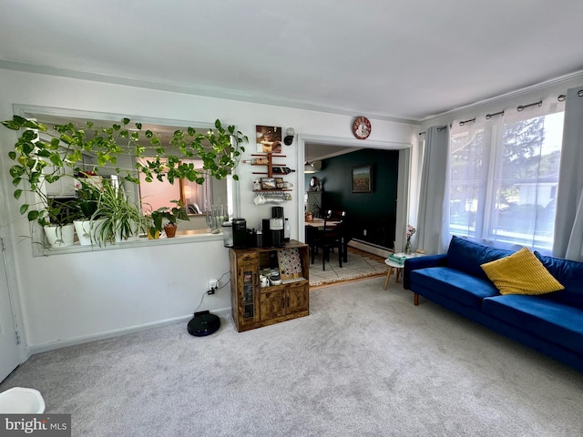 701 25th St, Huntingdon, PA 16652 - carpeted living room with a baseboard heating unit