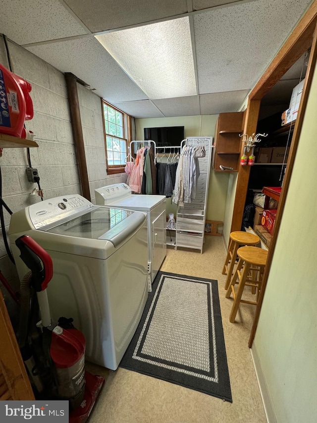 701 25th St, Huntingdon, PA 16652 - laundry area featuring washer and clothes dryer, concrete block wall, and baseboards
