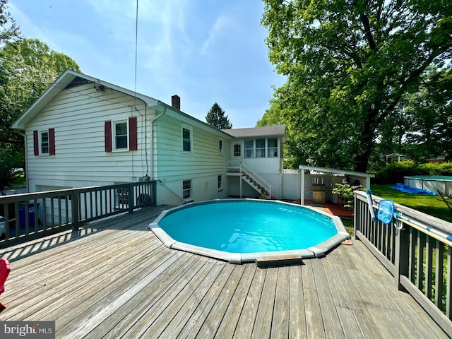 701 25th St, Huntingdon, PA 16652 - swimming pool featuring a wooden deck and stairway