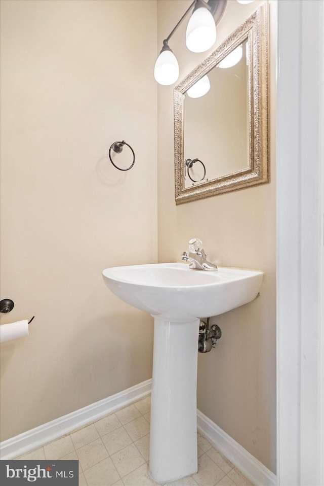 205 Quiet Ridge Ct, Pasadena, MD 21122 - bathroom with baseboards, tile patterned floors, and a sink