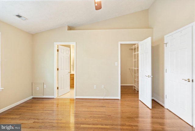 205 Quiet Ridge Ct, Pasadena, MD 21122 - unfurnished bedroom with lofted ceiling, wood finished floors, baseboards, and a closet