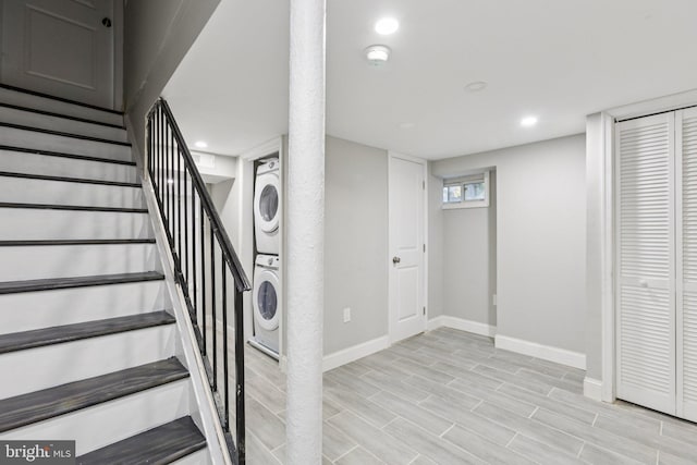 844 51st St NE, Washington, DC 20019 - staircase with stacked washer / dryer, baseboards, wood finished floors, and recessed lighting
