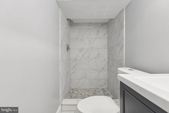 844 51st St NE, Washington, DC 20019 - full bathroom featuring tiled shower, vanity, and toilet