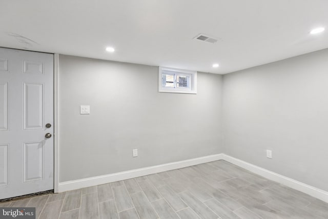 844 51st St NE, Washington, DC 20019 - below grade area with baseboards, recessed lighting, and light wood-style floors