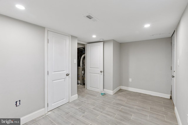 844 51st St NE, Washington, DC 20019 - finished below grade area featuring baseboards, recessed lighting, and light wood finished floors