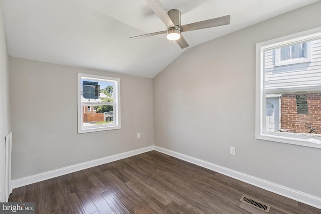 844 51st St NE, Washington, DC 20019 - empty room with lofted ceiling, ceiling fan, dark wood finished floors, and baseboards