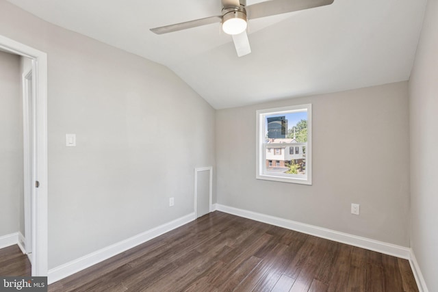844 51st St NE, Washington, DC 20019 - unfurnished room with dark wood finished floors, lofted ceiling, baseboards, and a ceiling fan