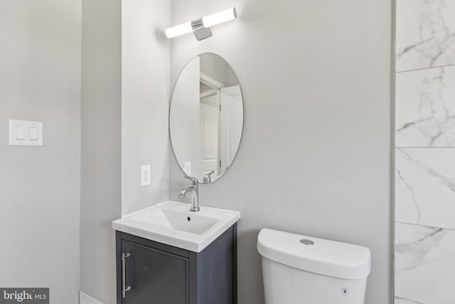 844 51st St NE, Washington, DC 20019 - bathroom featuring vanity and toilet