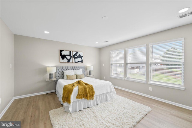21788 Regents Park Cir, Sterling, VA 20166 - bedroom with wood finished floors, baseboards, and recessed lighting