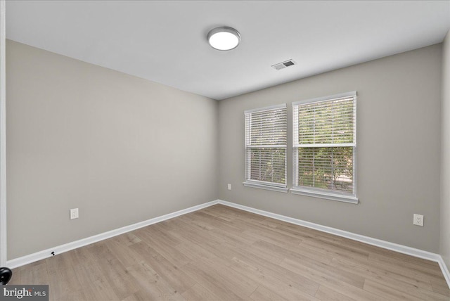 21788 Regents Park Cir, Sterling, VA 20166 - spare room featuring baseboards and light wood-style floors