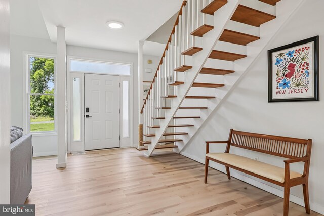 1012 Columbus Rd, Burlington, NJ 08016 - entryway with wood finished floors, healthy amount of natural light, stairway, and baseboards