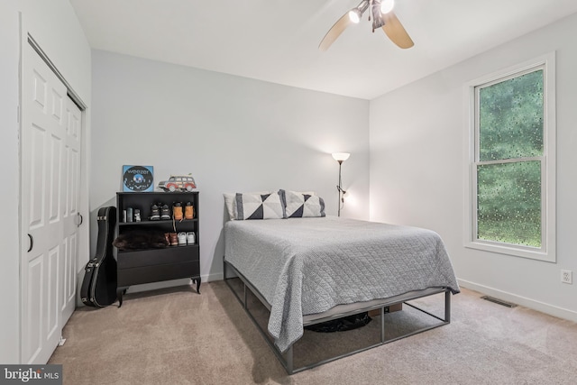 1012 Columbus Rd, Burlington, NJ 08016 - bedroom with light carpet, a closet, baseboards, and a ceiling fan