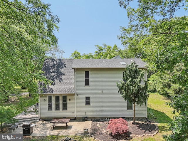 1012 Columbus Rd, Burlington, NJ 08016 - rear view of house with a patio area and an outdoor fire pit