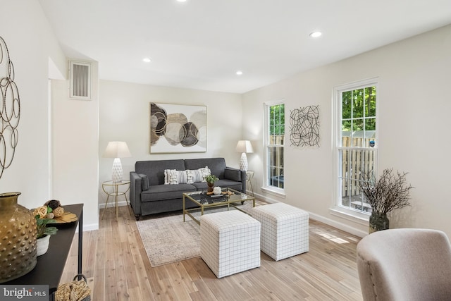 5836 Wood Poppy Ct, Burke, VA 22015 - living room featuring light wood-style floors, baseboards, and recessed lighting