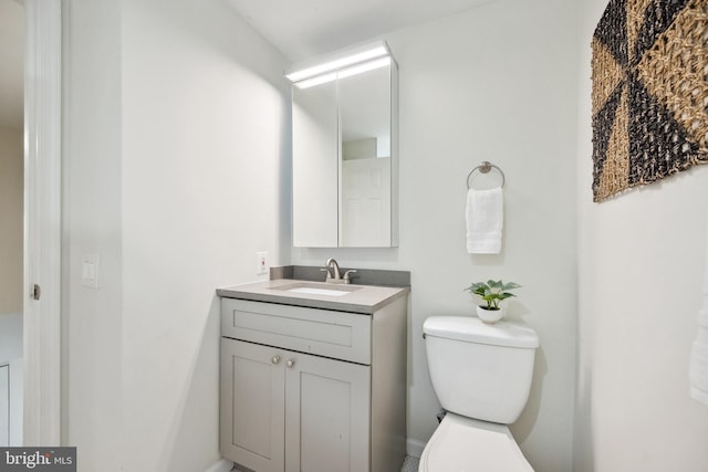 5836 Wood Poppy Ct, Burke, VA 22015 - bathroom with vanity and toilet