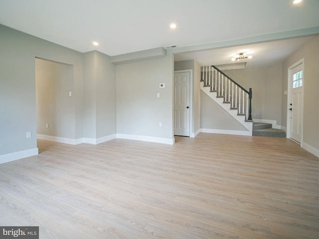 1200 First Ave, Media, PA 19063 - unfurnished living room featuring stairs, light wood finished floors, and recessed lighting