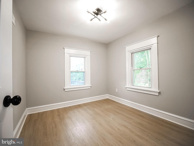 1200 First Ave, Media, PA 19063 - empty room with plenty of natural light and wood finished floors