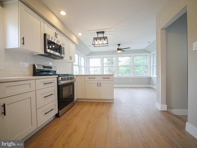 1200 First Ave, Media, PA 19063 - kitchen featuring appliances with stainless steel finishes, plenty of natural light, light wood-type flooring, a ceiling fan, and vaulted ceiling