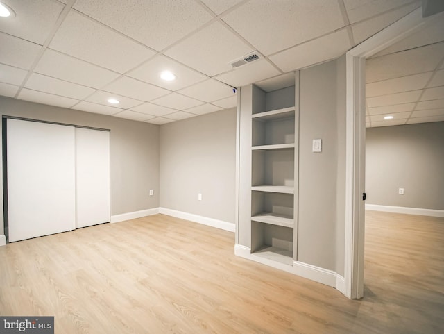 1200 First Ave, Media, PA 19063 - unfurnished bedroom featuring a paneled ceiling, light wood finished floors, recessed lighting, and a closet