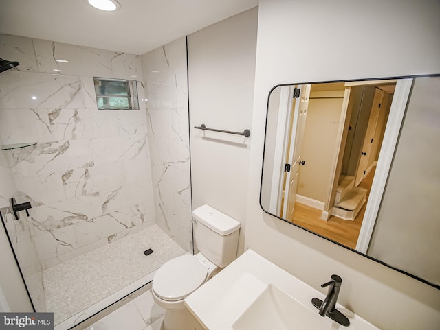 1200 First Ave, Media, PA 19063 - bathroom featuring a marble finish shower, marble look tiles, and vanity