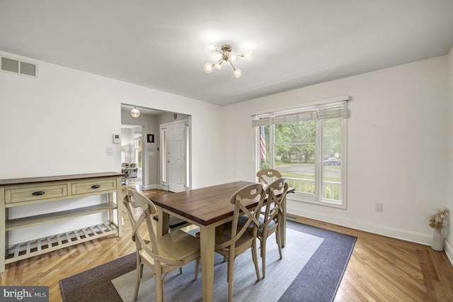 3 Monroe Ct, Plainsboro, NJ 08536 - dining space featuring baseboards and light wood-style flooring