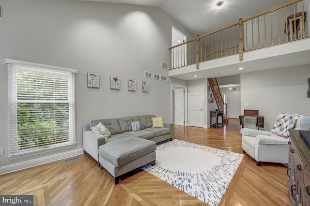3 Monroe Ct, Plainsboro, NJ 08536 - living room featuring high vaulted ceiling, baseboards, and stairs