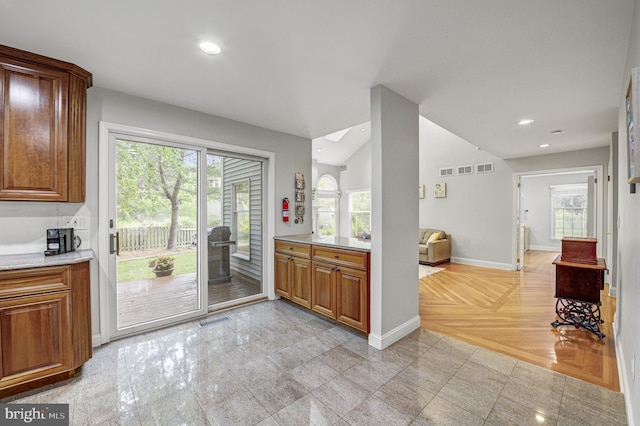 3 Monroe Ct, Plainsboro, NJ 08536 - kitchen featuring baseboards, recessed lighting, plenty of natural light, and brown cabinetry