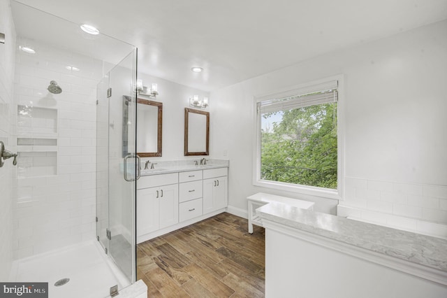 3 Monroe Ct, Plainsboro, NJ 08536 - full bathroom with double vanity, a stall shower, wood finished floors, and recessed lighting