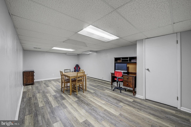 3 Monroe Ct, Plainsboro, NJ 08536 - office area featuring wood finished floors, a paneled ceiling, and baseboards