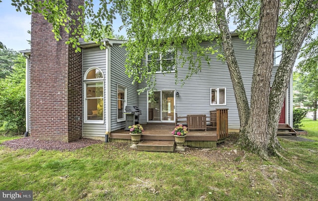 3 Monroe Ct, Plainsboro, NJ 08536 - back of house featuring a wooden deck, a lawn, and a chimney