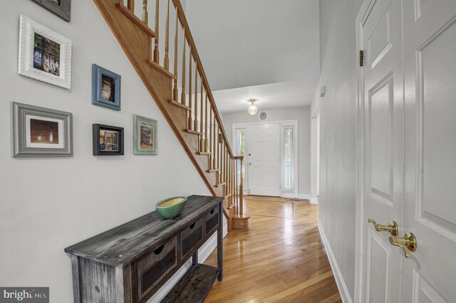 3 Monroe Ct, Plainsboro, NJ 08536 - foyer with baseboards, stairs, and light wood-style floors