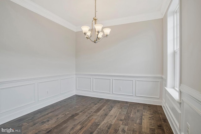 6911 Stansbury Ln, Landover, MD 20785 - spare room featuring a chandelier, ornamental molding, wainscoting, dark wood-style floors, and a decorative wall